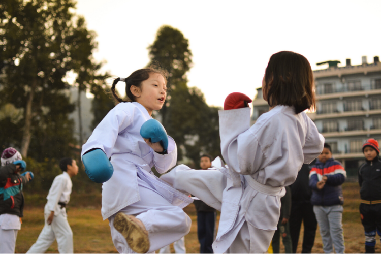 children practicing martial arts
